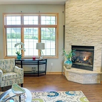 Alexian Village of Milwaukee Senior Living assisted living and independent living in Milwaukee, WI, living room with fireplace