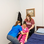 Caregivers practice skills in our Center of Excellence, a training space designed as a realistic simulation of a client’s home. Training occurring here helps caregivers identify hazardous items, learn more about the safety of a client’s home, and demonstrate the proper use of durable medical equipment (DME), so caregivers can better assist with mobility, transfers, bathing, and toileting assistance. 