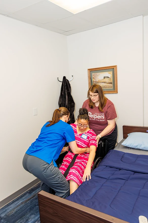Caregivers practice skills in our Center of Excellence, a training space designed as a realistic simulation of a client’s home. Training occurring here helps caregivers identify hazardous items, learn more about the safety of a client’s home, and demonstrate the proper use of durable medical equipment (DME), so caregivers can better assist with mobility, transfers, bathing, and toileting assistance. 