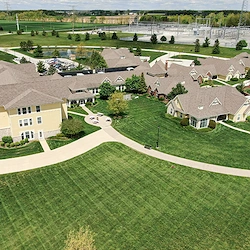 70 acre campus conveniently located 1 mi. west of Centennial Rd. 