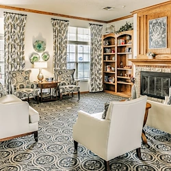 Alderbrook Village assisted living community in Arkansas City, KS, common sitting area by fireplace 