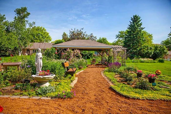 Covenant Living at The Holmstad in Batavia, IL, garden and sitting area