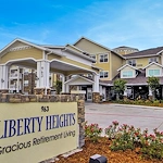 Liberty Heights Gracious Retirement Living Hawthorn Senior Independent Living in Rockwall, Texas front exterior entrance and welcome sign