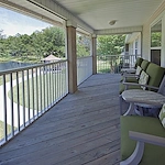 Allegro Fleming Island, senior living community offering independent living, assisted living, memory care, and respite care in Fleming Island, FL, covered deck with seating and a great view