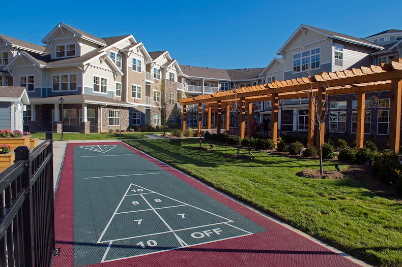 Northridge Gracious Retirement Living Hawthorn Senior Independent Living in Fishers, Indiana rear exterior shuffleboard