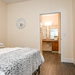 Charter Senior Living of Cleveland apartment bedroom and bathroom