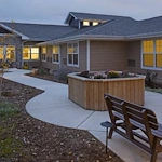 Greenridge Place Senior Assisted Living Memory Care in Westminster, CO rear exterior patio walking path