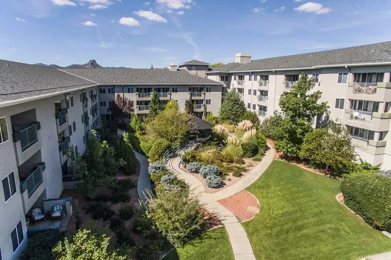 Independent living, assisted living, and memory care at Las Fuentes Resort Village in Prescott, AZ, outdoor space with a walking path