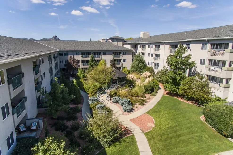 Independent living, assisted living, and memory care at Las Fuentes Resort Village in Prescott, AZ, outdoor space with a walking path