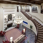 Franklin Park at Sonterra elegant staircase with chandelier