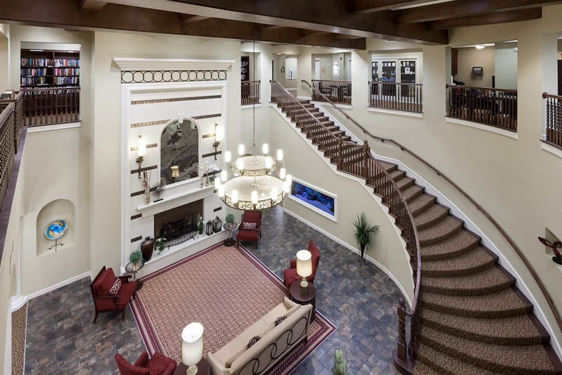 Franklin Park at Sonterra elegant staircase with chandelier