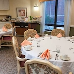 Addolorata Villa, continuing care retirement community offering independent living, assisted living, and memory care in Wheeling, IL, dining room with neatly set tables