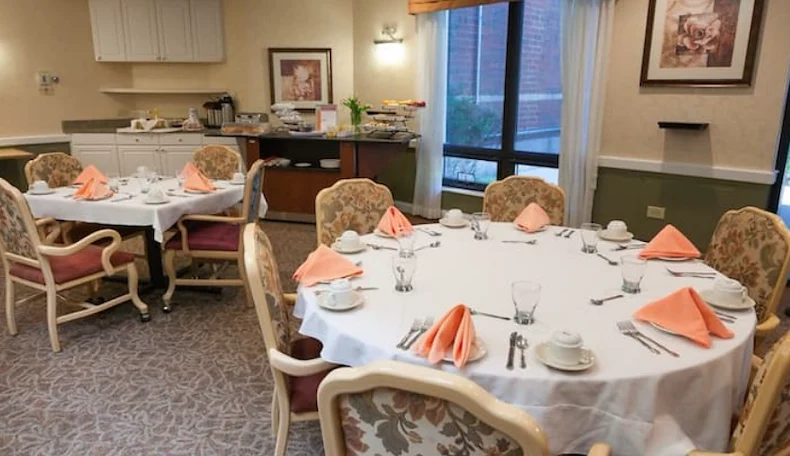 Addolorata Villa, continuing care retirement community offering independent living, assisted living, and memory care in Wheeling, IL, dining room with neatly set tables