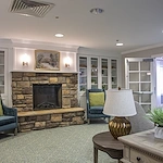 Dublin Glenn Memory Care in Ohio sitting area by fireplace