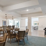 The Blake at Colonial Club car and dining area