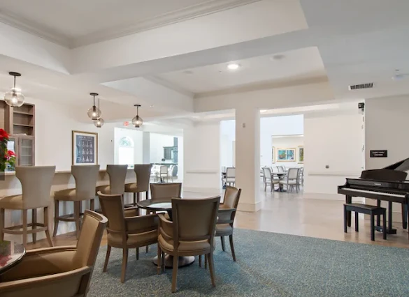 The Blake at Colonial Club car and dining area