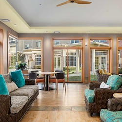 All Seasons West Bloomfield independent living in West Bloomfield, MI, sunroom with comfortable seating