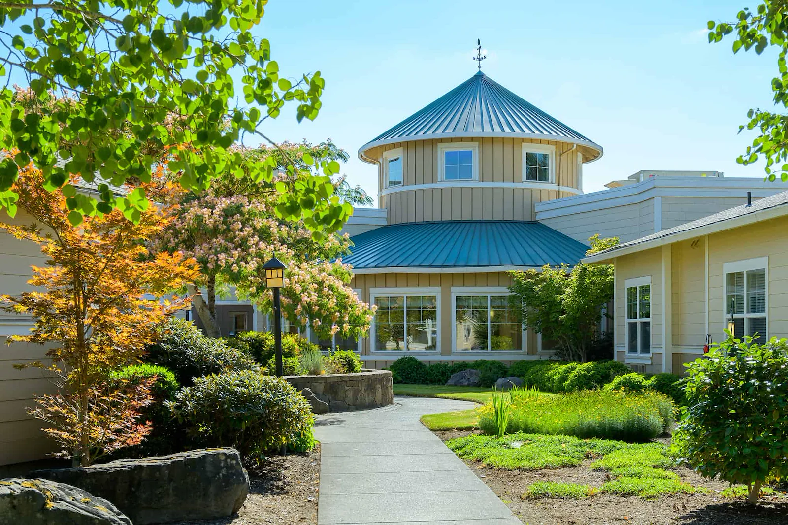 Hillside Senior Living in McMinnville, OR, exterior and walking path