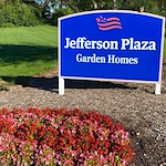 American Village Lincoln Lodge senior living community offering independent living, assisted living, and memory care in Indianapolis, IN, outdoor entrance sign to Jefferson Plaza Garden Homes