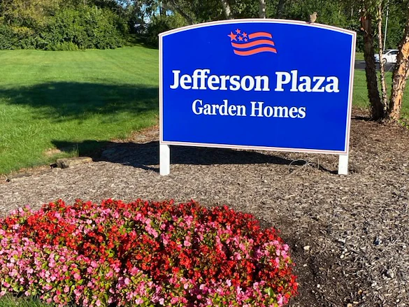 American Village Lincoln Lodge senior living community offering independent living, assisted living, and memory care in Indianapolis, IN, outdoor entrance sign to Jefferson Plaza Garden Homes