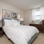 Addolorata Villa, continuing care retirement community offering independent living, assisted living, and memory care in Wheeling, IL, cozy apartment bedroom