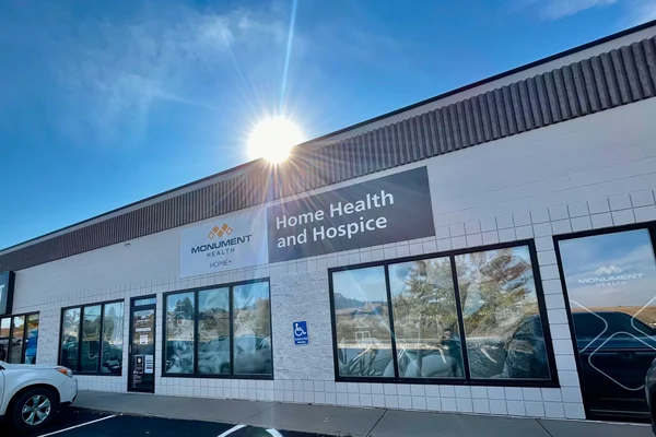 Monument Health Home Plus Hospice's Logo