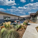 Aspens at Fort Collins Senior Living, senior living community offering assisted living, memory care, and respite care in Fort Collins, CO, outdoor area with walkinig path