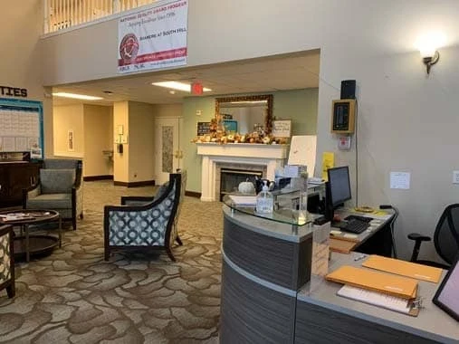 Avamere at South Hill senior living community offering assisted living and respite care in Spokane, WA, lobby with front desk and common sitting area