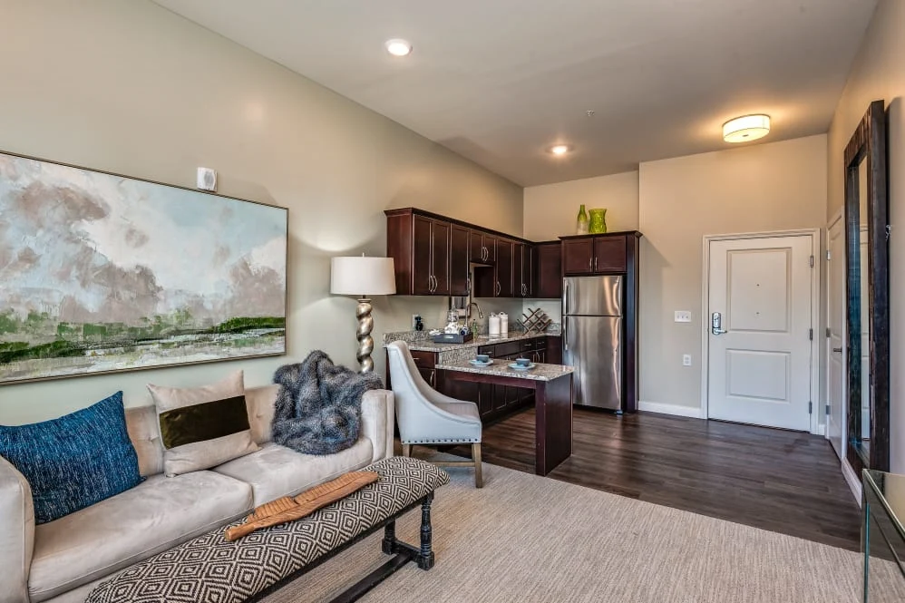 The Commons on Meridian Senior Living in Indianapolis, IN apartment living room and kitchen