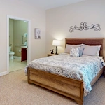 Bedroom in an apartment at Gaines Park Senior Living