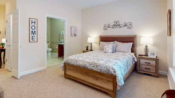 Bedroom in an apartment at Gaines Park Senior Living