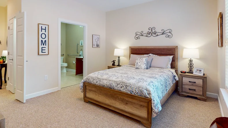 Bedroom in an apartment at Gaines Park Senior Living