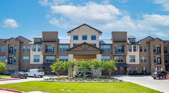 Watermere McKinney senior living community offering active adult living and independent living in McKinney, TX, front exterior and entrance
