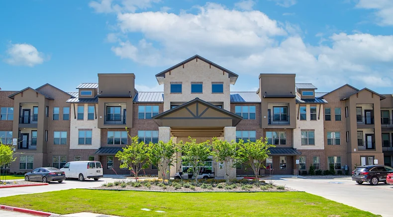 Watermere McKinney senior living community offering active adult living and independent living in McKinney, TX, front exterior and entrance
