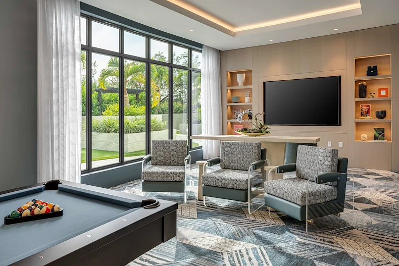 Allegro Fort Lauderdale, senior living community in Fort Lauderdale, FL, offering independent living, assisted living, memory care, and respite care, activities room with a pool table