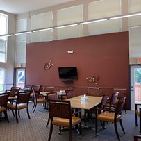 Suncrest Village independent senior living apartments in Newton, Iowa community media dining room