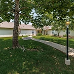 Ashbrook Village senior living community offering independent living, assisted living, and memory care in Duncan, OK, outdoor space with a walking path