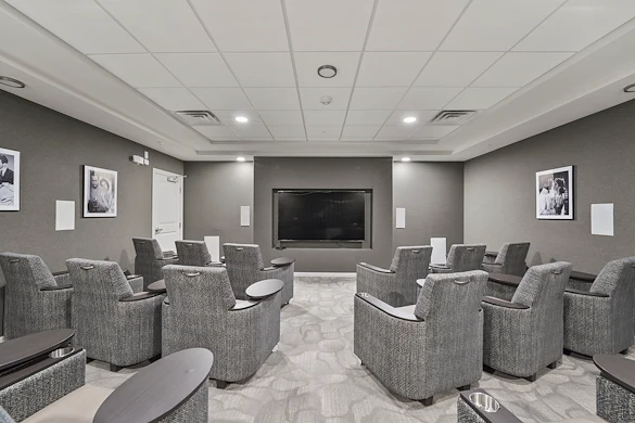 Alto Johns Creek, senior living community offering assisted living, memory care, and respite care in Duluth, GA, movie theatre