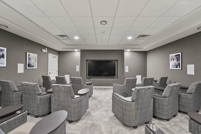Alto Johns Creek, senior living community offering assisted living, memory care, and respite care in Duluth, GA, movie theatre