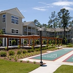 Summerville Estates Gracious Retirement Living Hawthorn Senior Independent Living in Summerville, South Carolina rear exterior gazebo shuffleboard area