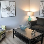 American House Westland Venoy senior living community offering independent living, assisted living, and respite care in Westland, MI, apartment living room