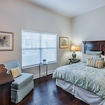 Brightmore of South Charlotte senior living community offering independent living, assisted living, and memory care in Charlotte, NC, apartment bedroom
