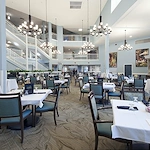 Allegro Tallahassee senior living offering independent living, assisted living, and respite care in Tallahassee, FL, dining room with elegant lighting