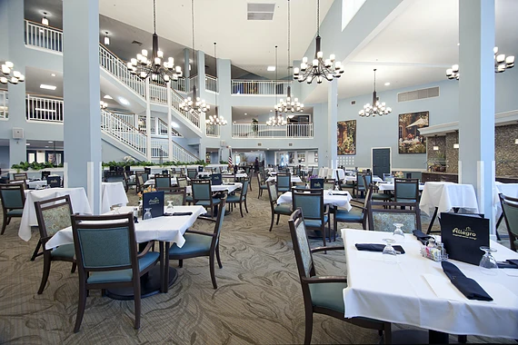 Allegro Tallahassee senior living offering independent living, assisted living, and respite care in Tallahassee, FL, dining room with elegant lighting