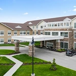 Alto Overland Park, senior living community offering assisted living and memory care in Overland Park, KS, front entrance with covered drive-through