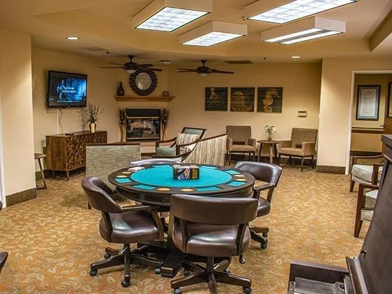 Avamere at Seaside senior living community offering independent living, assisted living, memory care, and respite care in Seaside, OR, lounging area with a game table