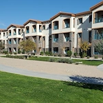 Walking paths throughout the community. Views of apartment homes from courtyard
