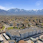 Olympus Ranch Gracious Retirement Living Hawthorn Senior Independent Living in Murray, Utah exterior drone view