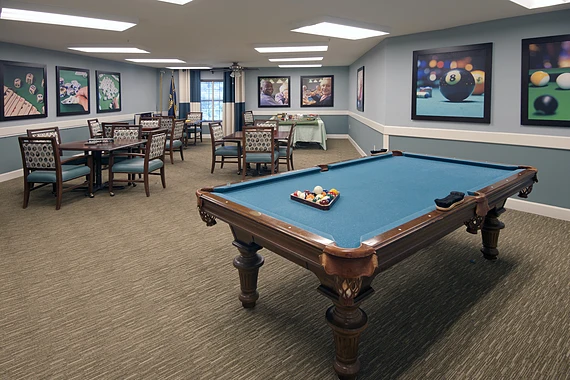 Allegro Tallahassee senior living offering independent living, assisted living, and respite care in Tallahassee, FL, activities room featuring a pool table and tables for games