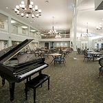Allegro St. Augustine senior living offering independent living, assisted living, and respite care in Saint Augustine, FL, dining room with elegant lighting